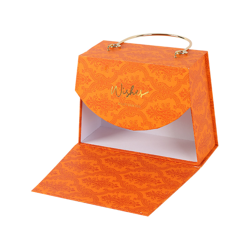 Elegante caja de regalo de cartón naranja con asa de metal